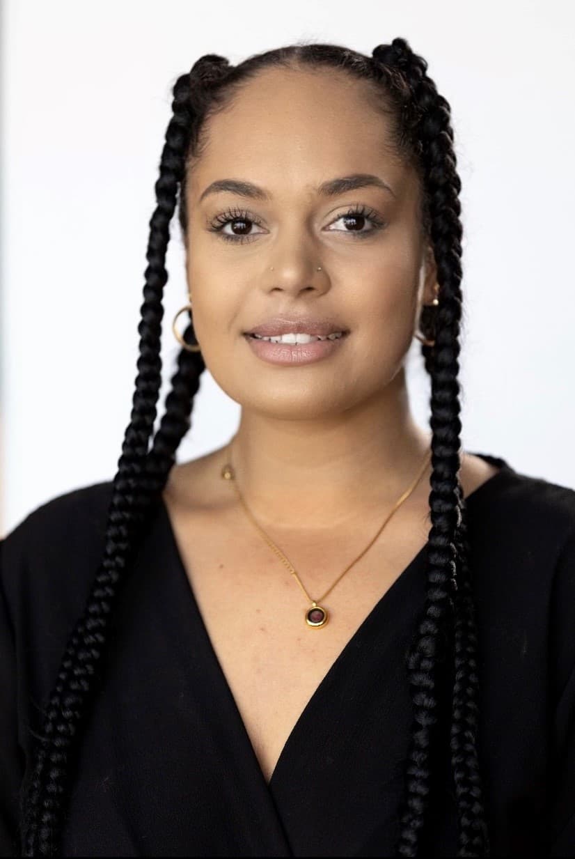 A headshot of Larisha Jerome. She wears a black top.